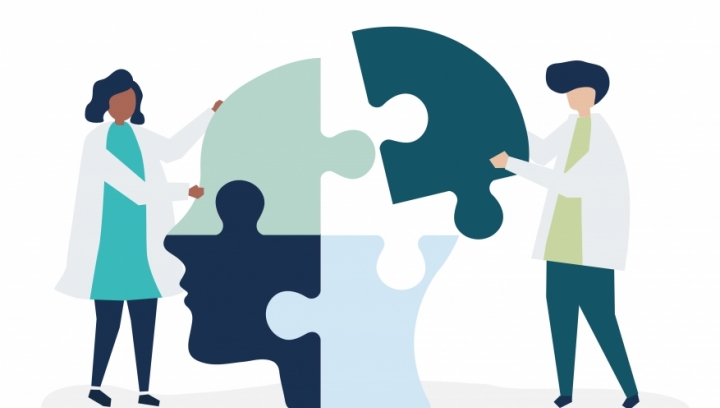 Cabeça feita com peças de quebra-cabeça